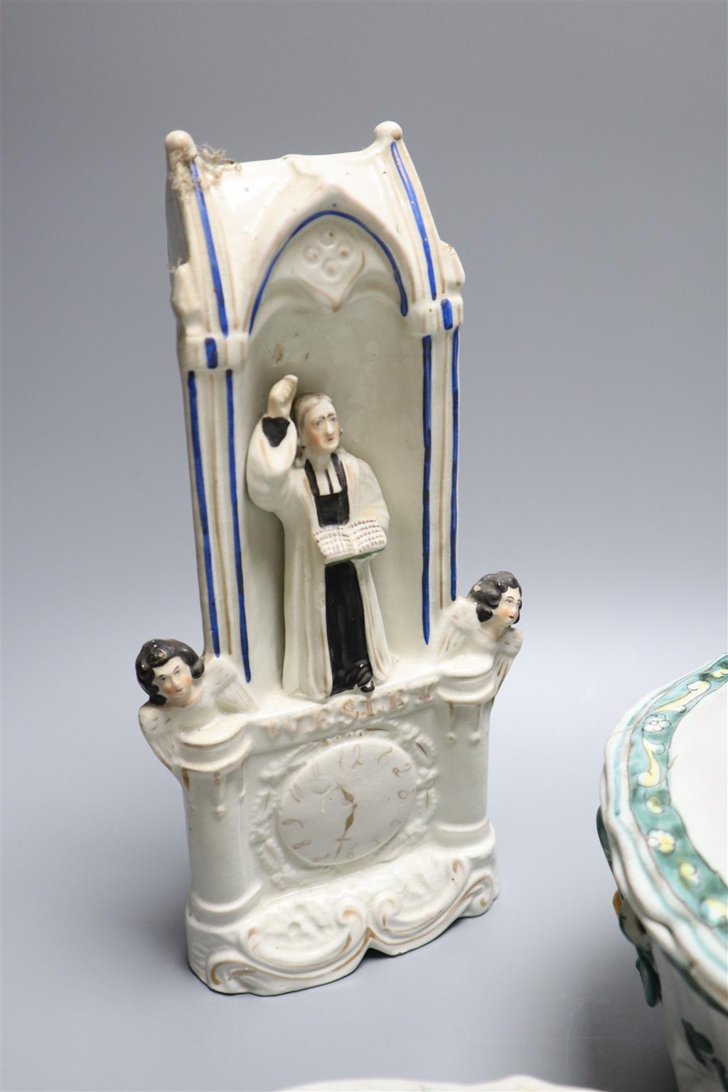 Two 19th century French faience tureens and covers and a Staffordshire pottery group, height 28cm